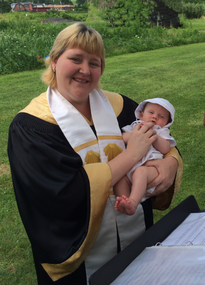 Reverend Brenda Pun during an outdoor Baptism